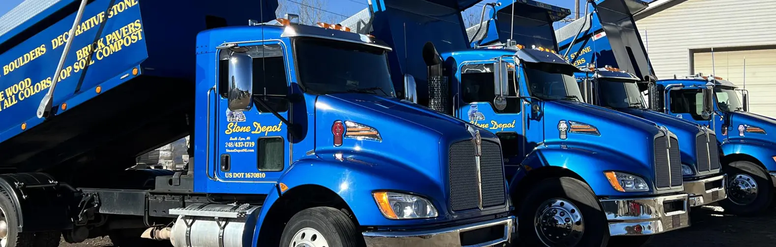 Cover Row Of Trucks Banner