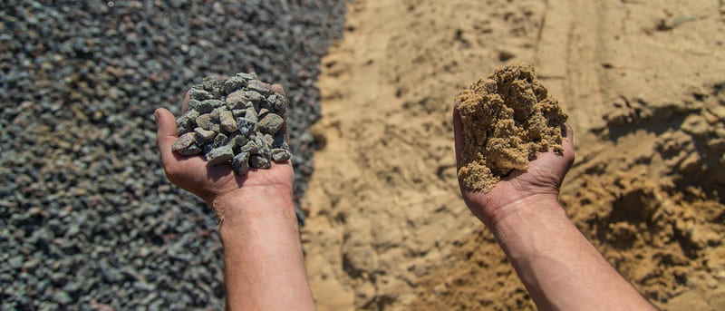 Handfuls Of Sand And Gravel For Landscaping Projects