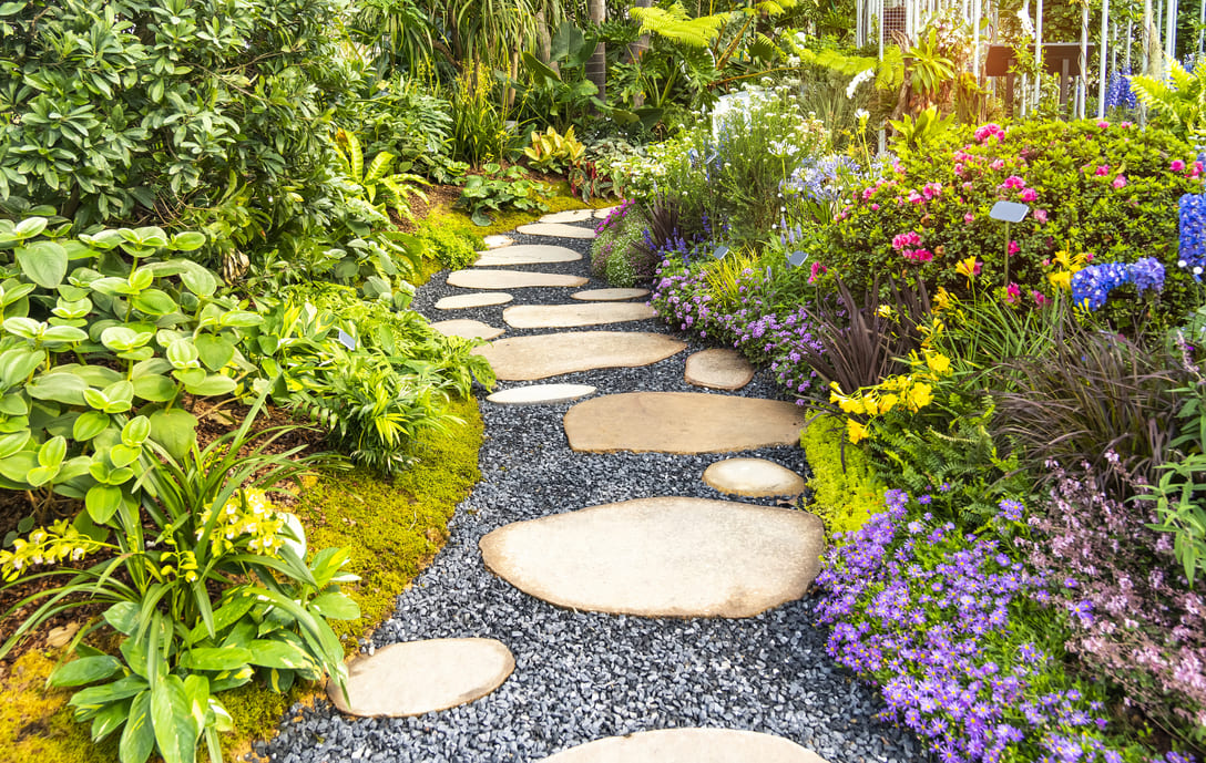 Web Stone Depot Landscaping Supplies South Lyon Michigan Spring Landscaping Flagstone Pathway Garden stone pathway and gravel walk surrounded by lush spring landscaping