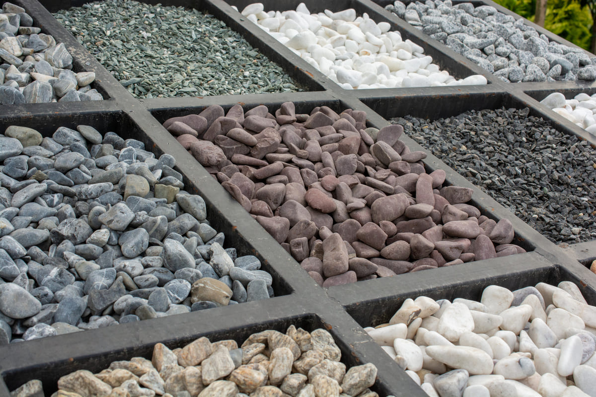 Web Stone Depot Landscaping Supplies South Lyon Michigan Decorative Stones Display A display grid showing various decorative stone options.